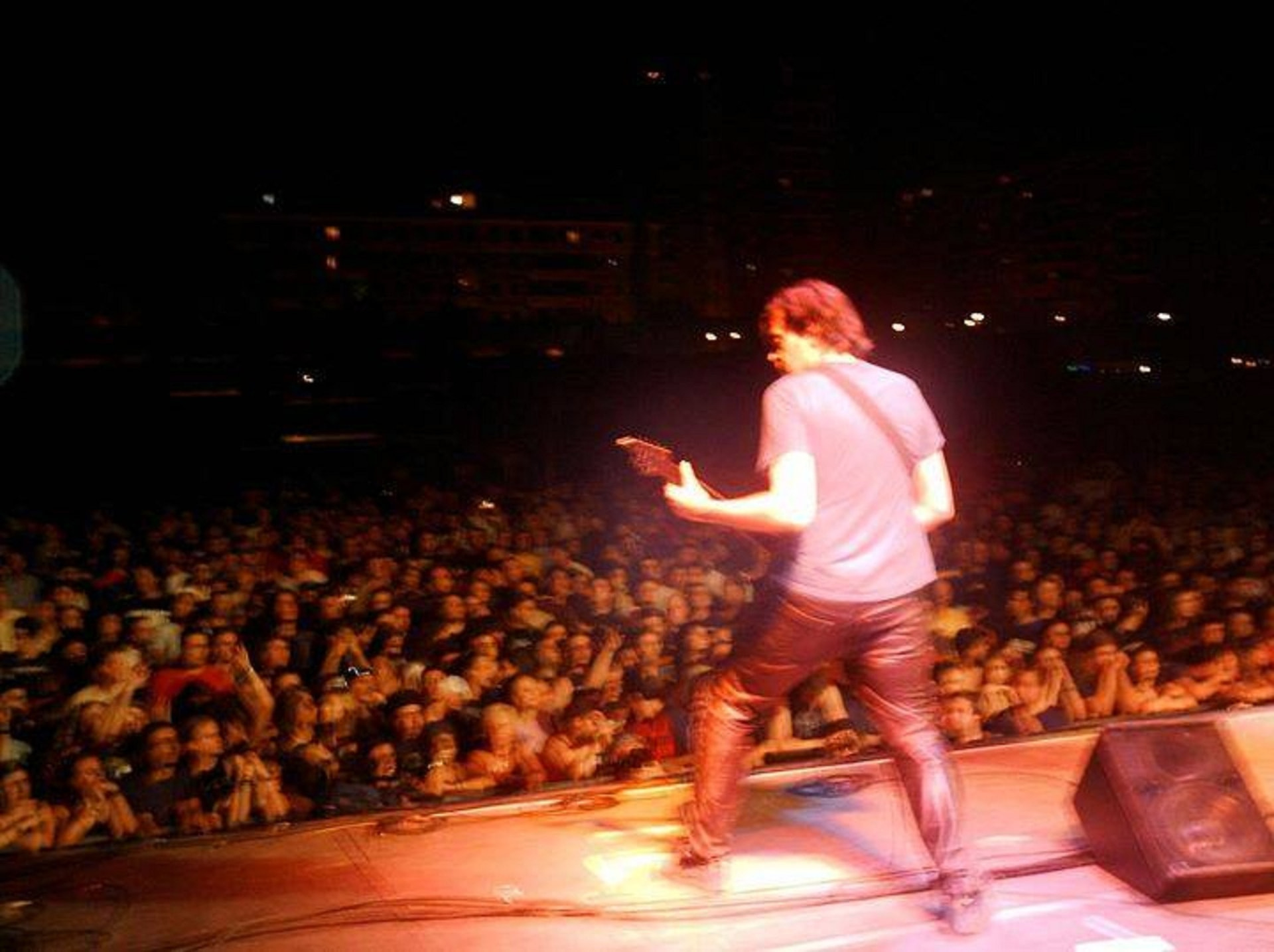Jordi Sandalinas performing electric guitar before a live audience